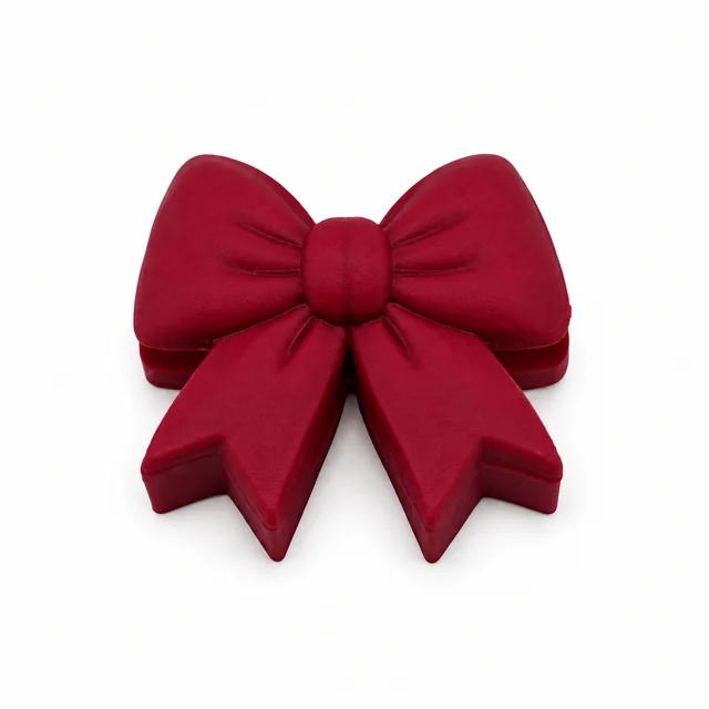 Front view of a wine-colored bow with folded loops and ribbon tails.